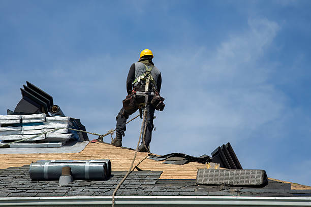 Professional Roofing technician working in North Chelmsford, MA